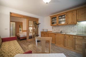 Kuchyň nebo kuchyňský kout v ubytování Appartement & Hotel Innerhofer
