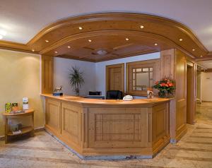 a large lobby with a reception desk in a building at Hotel Rössle in Bernau im Schwarzwald +42 photos
