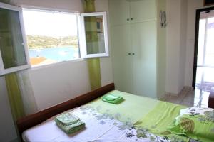 Postel nebo postele na pokoji v ubytování Villa Masline