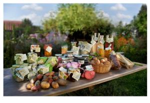 a table with a bunch of different types of food at Landhaus-Apartments in Wattenheim