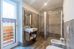 Koupelna v ubytování parina Inn – Locanda + 37 fotografií