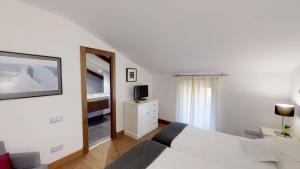 Posteľ alebo postele v izbe v ubytovaní Villa Cornelius Lujo Rural 5 Estrellas Verdes