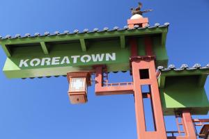 a lego depiction of the koreatown sign on a building at Olyver Hotel in Los Angeles