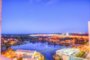 an aerial view of a city at night at Tidewater Beach Resort 1818 By Aneliya in Panama City Beach