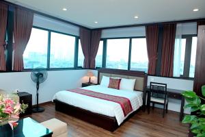 Giường trong phòng chung tại Monaco building 901