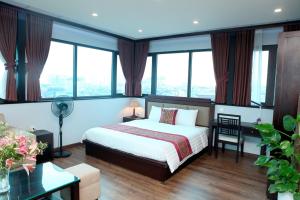Giường trong phòng chung tại Monaco building 901