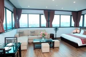 Giường trong phòng chung tại Monaco building 901
