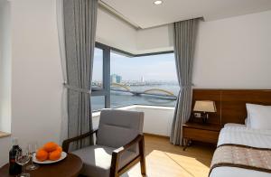 Ένα ή περισσότερα κρεβάτια σε δωμάτιο στο Val Soleil Hotel