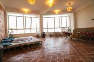 Area soggiorno di Chibha Classic Inn