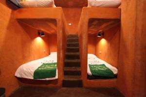 Postel nebo postele na pokoji v ubytování Jialeshuel Surf house B&B