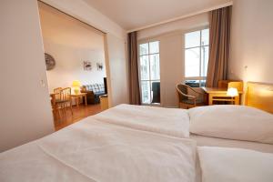 Ein Bett oder Betten in einem Zimmer der Unterkunft Seepark Sellin - Apt. 635