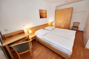 Ein Bett oder Betten in einem Zimmer der Unterkunft Seepark Sellin - Apt. 635