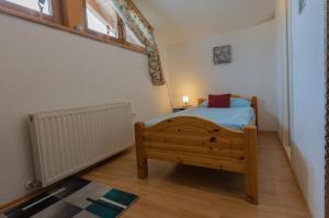 A bed or beds in a room at Apart Georg