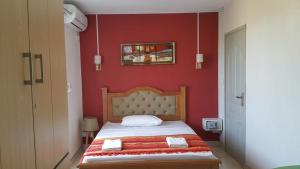 Voodi või voodid majutusasutuse Krishangel Beach Apartment toas