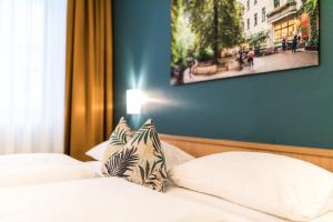 Postel nebo postele na pokoji v ubytování martas Hotel Allegra Berlin