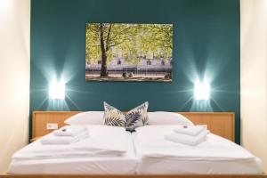 Postel nebo postele na pokoji v ubytování martas Hotel Allegra Berlin