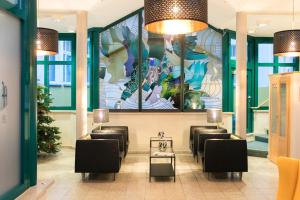 TV a/nebo společenská místnost v ubytování martas Hotel Allegra Berlin