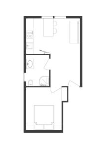 a black and white floor plan of a house at Apartman Diófa in Keszthely