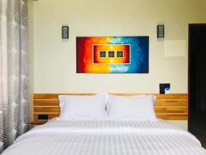 Voodi või voodid majutusasutuse IRIS Beach Residence toas