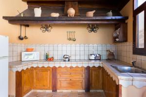 Kuchyňa alebo kuchynka v ubytovaní Casa Rural Tile