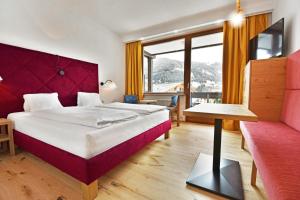 Postel nebo postele na pokoji v ubytování Hotel NockResort