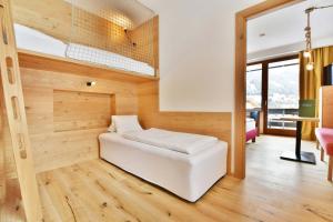 Postel nebo postele na pokoji v ubytování Hotel NockResort