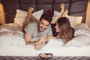 Postel nebo postele na pokoji v ubytování Boutique Hotel Kircher