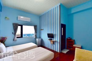 A bed or beds in a room at Fish's Home
