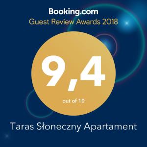 Certyfikat, podpis lub inny dokument wystawiony w obiekcie Baltic Apartments - Apartament Słoneczny Taras