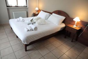 Postel nebo postele na pokoji v ubytování Hotel Ristorante Château