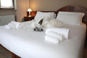 Postel nebo postele na pokoji v ubytování Hotel Ristorante Château