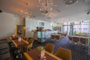 Restaurace v ubytování Business Hotel Astrum Laus