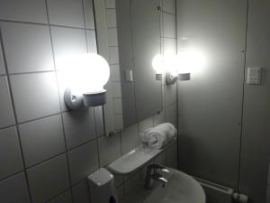 Koupelna v ubytování City Hotel Nebo