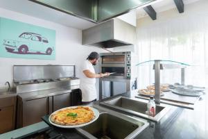 Kuchnia lub aneks kuchenny w obiekcie Hotel Palia Dolce Farniente 3 Sup