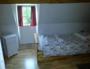 Postel nebo postele na pokoji v ubytování Gite Allier