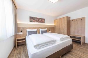 Ένα ή περισσότερα κρεβάτια σε δωμάτιο στο Residence Lersc
