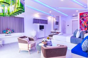 Et tv og/eller underholdning på Cocotoa Boutique Hotel & Villa