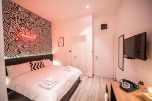 Postel nebo postele na pokoji v ubytování Hotel Marienplatz Podgorica
