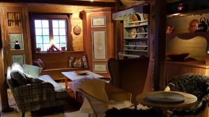 Posezení v ubytování Vargheden B&B och trädgård