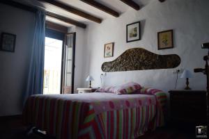 Postel nebo postele na pokoji v ubytování Casa Rural Dolores