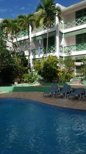Der Swimmingpool an oder in der Nähe von TERRAZAS DEL CARIBE, APARTA HOTEL.