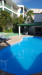 Bazén v ubytování TERRAZAS DEL CARIBE, APARTA HOTEL. nebo v jeho okolí