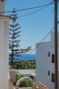 a view of the ocean from a building at Athanasia Studios in Patitiri