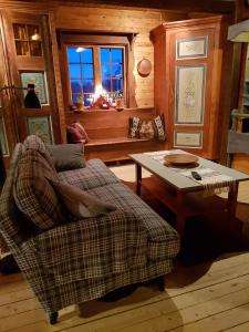 Posezení v ubytování Vargheden B&B och trädgård