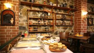 Restoran atau tempat lain untuk makan di Archontiko Koziakas