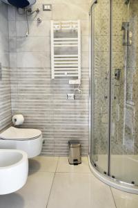 Kúpeľňa v ubytovaní Costantino Suites
