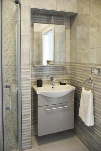 Koupelna v ubytování Costantino Suites