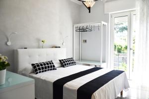 Posteľ alebo postele v izbe v ubytovaní Costantino Suites