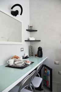 Kuchyňa alebo kuchynka v ubytovaní Costantino Suites