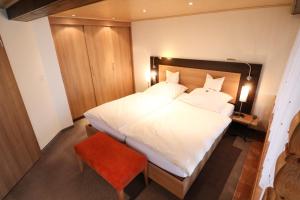 Postel nebo postele na pokoji v ubytování Hotel Wiehen-Therme